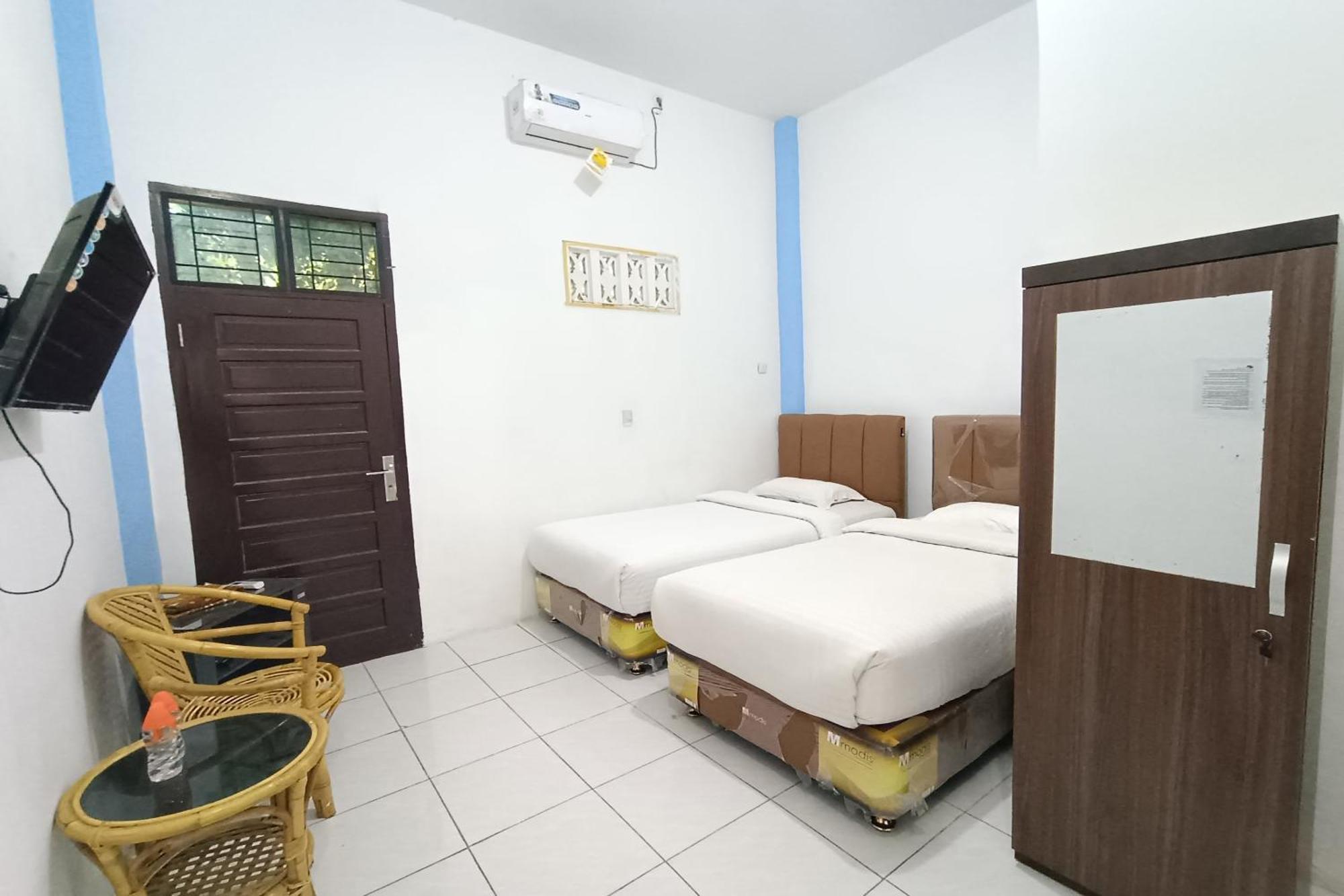 Oyo 92207 Koperasi 2*