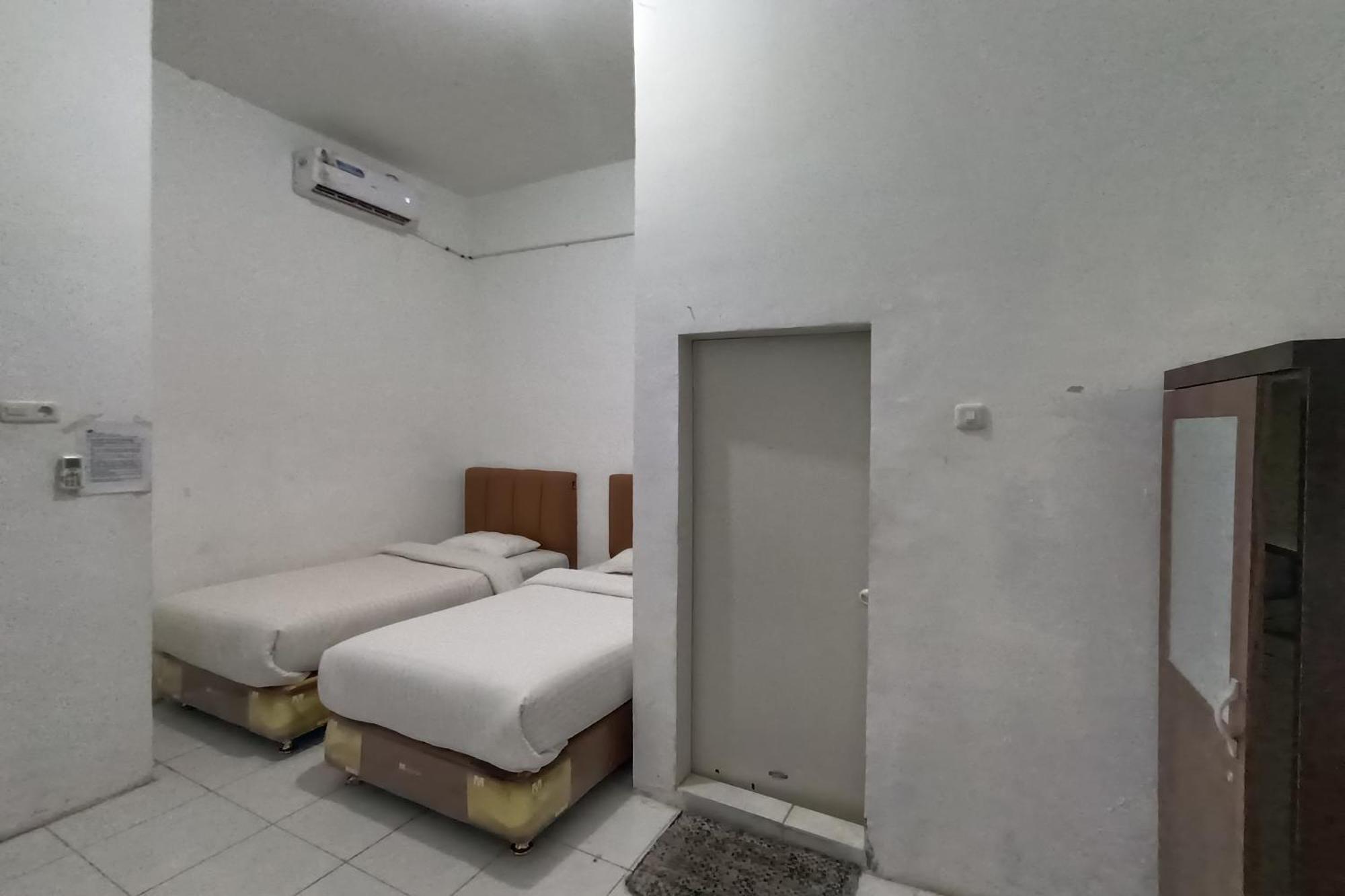 Oyo 92207 Koperasi Hotel